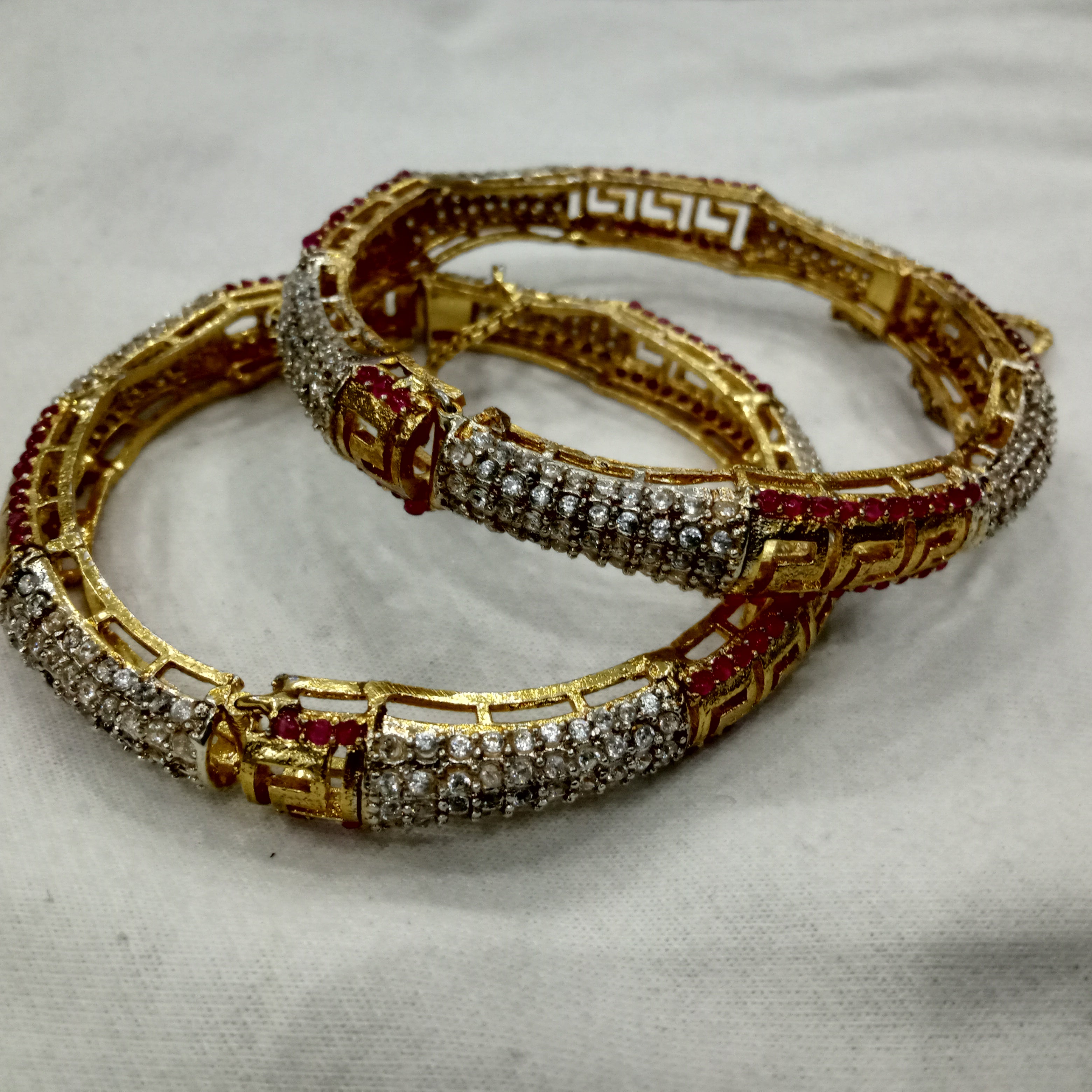 Elegant 22K Gold-Plated Greek Key Bangles with Ruby & CZ Pavé (Pair)