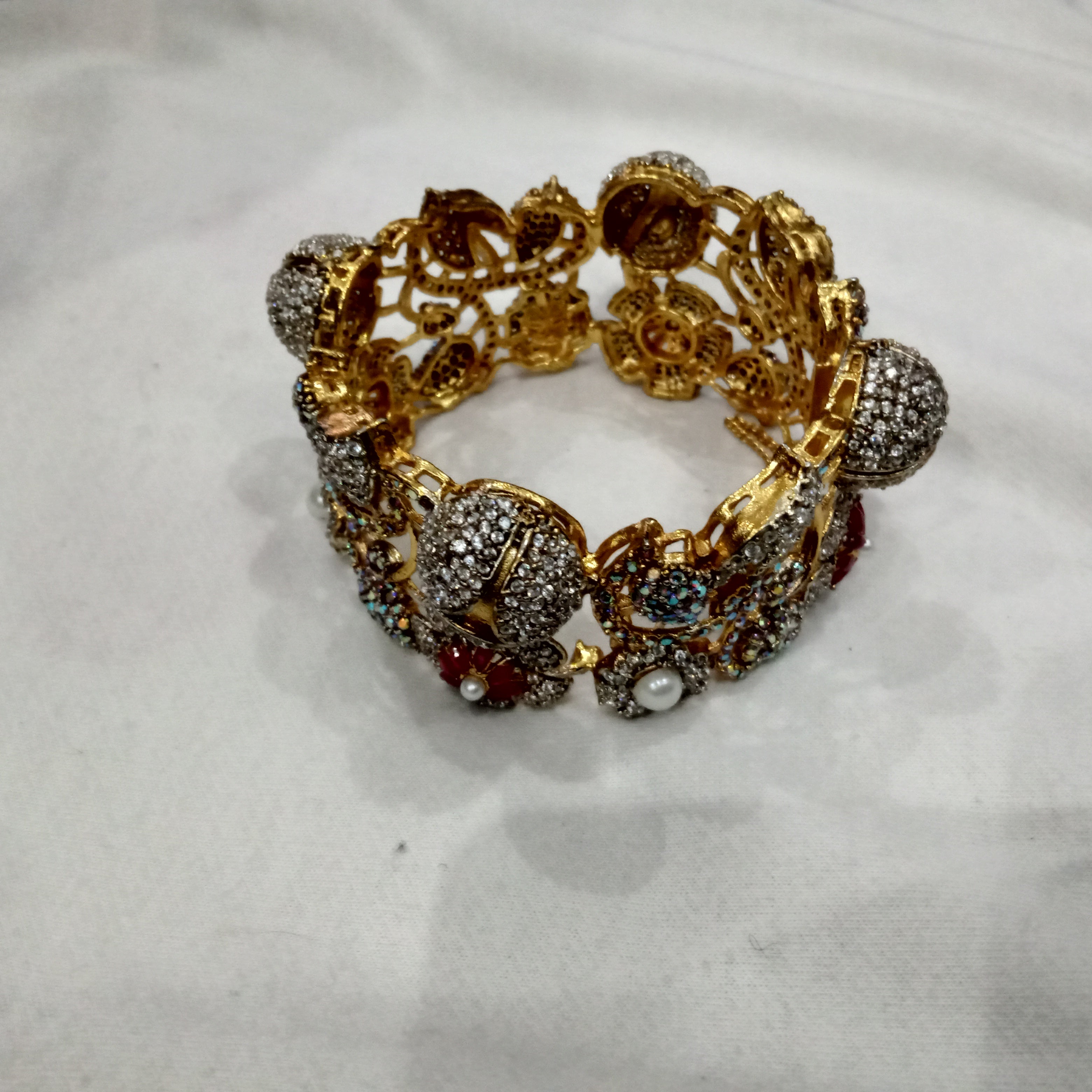 Royal Mughal-Inspired Filigree Kada Bangle – Gold Finish with Ruby, Pearl & Crystal Accents